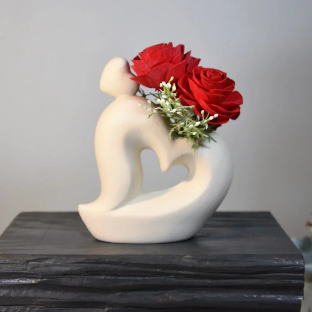 Sexy white curvy hearts vase with 4 red Sola wood roses that will last forever!